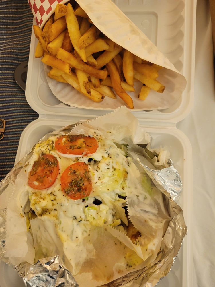 Sinbad's famous gyro in Ocean City, MD — carved gyro meat with tzatziki and tomato, served with a side of fries